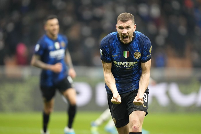 Inter Milan's Edin Dzeko celebrates after scoring his side's 2nd goal during a Serie A soccer match between Inter Milan and Venezia at the San Siro stadium in Milan, Italy, Saturday, Jan. 22, 2022. (AP Photo/Luca Bruno)