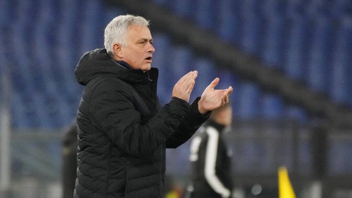 Romas head coach Jose Mourinho claps his hands during the Italian Cup soccer match between Roma and Lecce at Romes Olympic stadium, Thursday, Jan. 20, 2022. (AP Photo/Alessandra Tarantino)