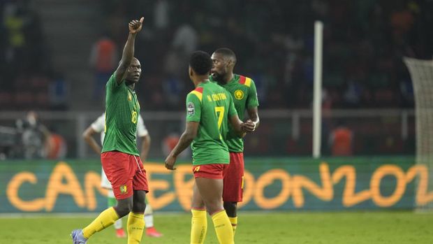 Cameroon's Vincent Aboubakar, left, celebrates scoring his side's second goal during the African Cup of Nations 2022 round of 16 soccer match between Cameroon and Comoros at the Olembe stadium in Yaounde, Cameroon, Monday, Jan. 24, 2022. (AP Photo/Themba Hadebe)