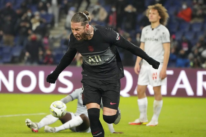 PSGs Sergio Ramos celebrates after scoring his sides second goal during the French League One soccer match between Paris Saint Germain and Reims at the Parc des Princes in Paris, Sunday, Jan. 23, 2022. (AP Photo/Francois Mori)