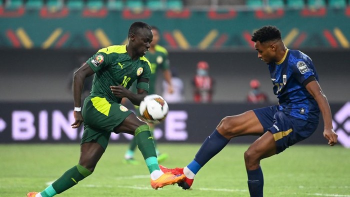 Senegals forward Sadio Mane (L) is challenged by Cape Verdes defender Steven Fortes during the Africa Cup of Nations (CAN) 2021 round of 16 football match between Senegal and Cape Verde at Stade de Kouekong in Bafoussam on January 25, 2022. (Photo by Pius Utomi EKPEI / AFP)