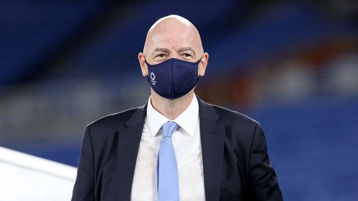 YOKOHAMA, JAPAN - AUGUST 07: Gianni Infantino, President of FIFA is seen wearing a face mask during the Mens Football Competition Medal Ceremony on day fifteen of the Tokyo 2020 Olympic Games at International Stadium Yokohama on August 07, 2021 in Yokohama, Kanagawa, Japan. (Photo by Alexander Hassenstein/Getty Images)