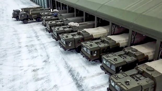 In this photo taken from video provided by the Russian Defense Ministry Press Service on Tuesday, Jan. 25, 2022, The Russian army's Iskander missile launchers and support vehicles prepare to deploy for drills in Russia. (Russian Defense Ministry Press Service via AP)