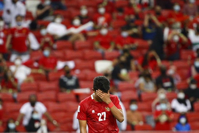 Dedik Setiawan of Indonesia reacts during the AFF Suzuki Cup 2020 final first leg soccer match between Indonesia and Thailand in Singapore, Wednesday, Dec. 29, 2021. (AP Photo/Suhaimi Abdullah)