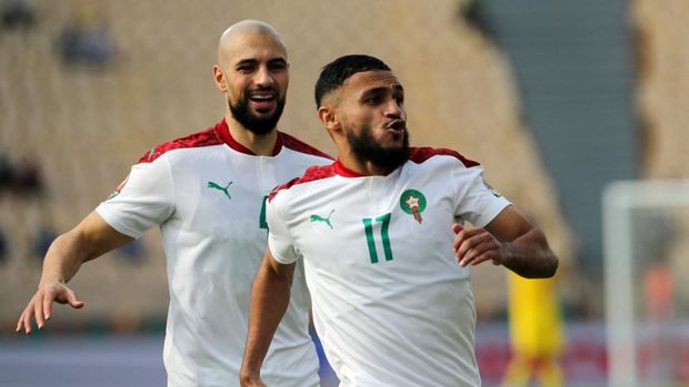 Soccer Football - Africa Cup of Nations -  Quarter Final - Egypt v Morocco -  Ahmadou Ahidjo Stadium, Yaounde, Cameroon - January 30, 2022 Morocco's Sofiane Boufal celebrates scoring their first goal with Sofyan Amrabat REUTERS/Mohamed Abd El Ghany
