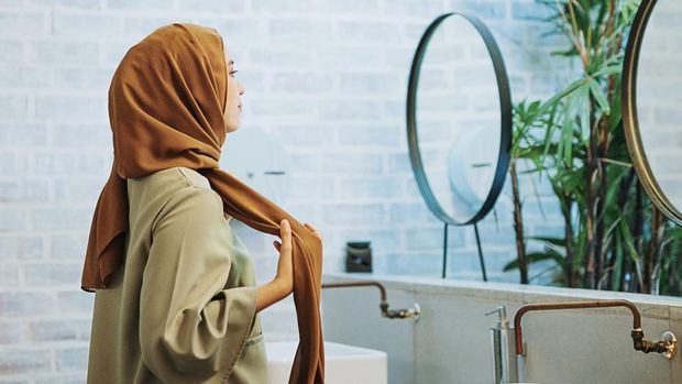 Ilustrasi perempuan mengenakan hijab
