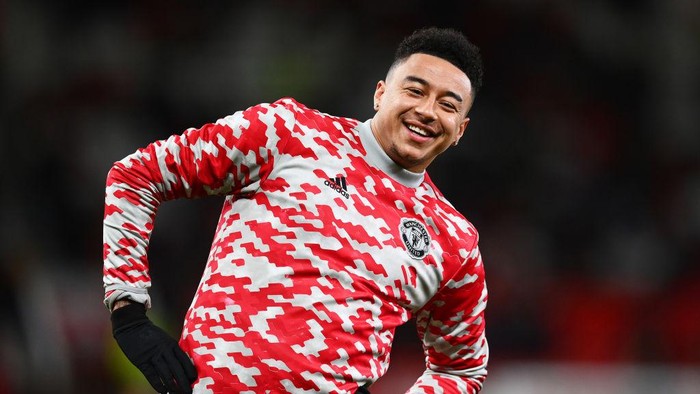 MANCHESTER, ENGLAND - DECEMBER 30: Jesse Lingard of Manchester United reacts as he warms up prior to the Premier League match between Manchester United and Burnley at Old Trafford on December 30, 2021 in Manchester, England. (Photo by Dan Mullan/Getty Images)