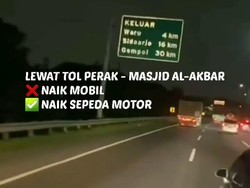Viral Dua Pemuda Berboncengan Motor Masuk Tol Surabaya
