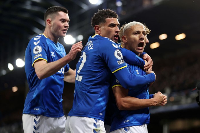 Everton LIVERPOOL, ENGLAND - DECEMBER 06: Richarlison of Everton celebrates after scoring their team's first goal which is later ruled offside during the Premier League match between Everton and Arsenal at Goodison Park on December 06, 2021 in Liverpool, England. (Photo by Naomi Baker/Getty Images)