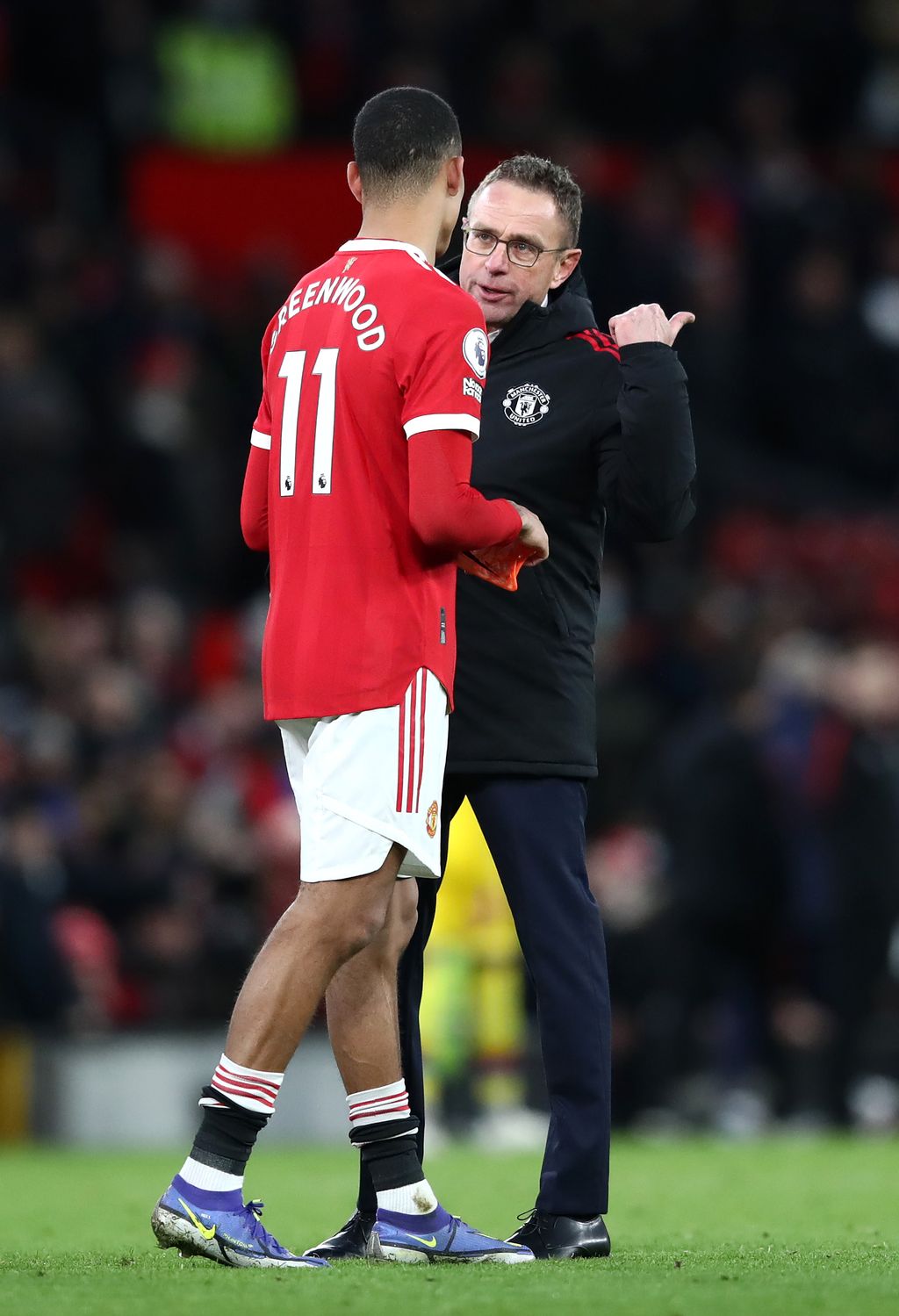 MANCHESTER, ENGLAND - DECEMBER 05: Mason Greenwood of Manchester United in discusion with Ralf Rangnick, Manager of Manchester United after the Premier League match between Manchester United and Crystal Palace at Old Trafford on December 05, 2021 in Manchester, England. (Photo by Jan Kruger/Getty Images)