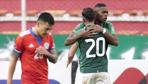 Soccer Football - World Cup - South American Qualifiers - Bolivia v Chile - Olympic Stadium Hernando Siles, La Paz, Bolivia - February 1, 2022 Bolivia's Marc Enoumba celebrates scoring their first goal withFernando Saucedo REUTERS/Manuel Claure