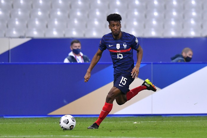 PARIS, FRANCE - MARCH 24: Kingsley Coman of France runs with the ball during the FIFA World Cup 2022 Qatar qualifying match between France and Ukraine on March 24, 2021 in Paris, France. Sporting stadiums around France remain under strict restrictions due to the Coronavirus Pandemic as Government social distancing laws prohibit fans inside venues resulting in games being played behind closed doors. (Photo by Aurelien Meunier/Getty Images)