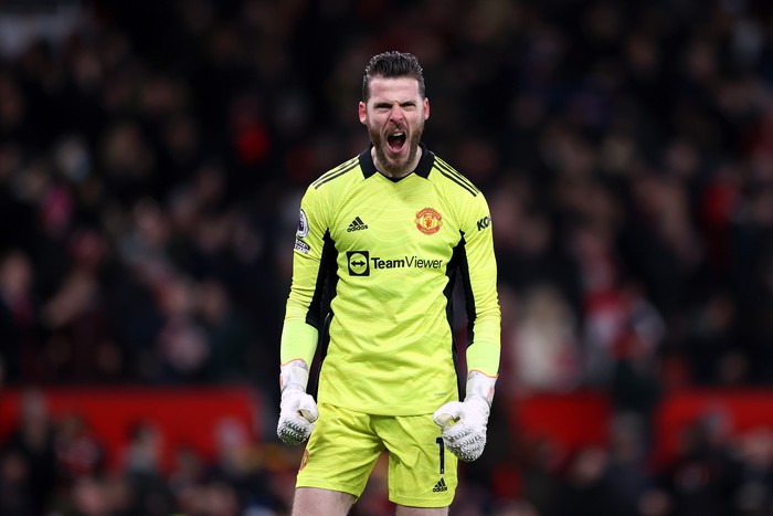 MANCHESTER, ENGLAND - JANUARY 22: David De Gea of Manchester United celebrates his teams first goal during the Premier League match between Manchester United and West Ham United at Old Trafford on January 22, 2022 in Manchester, England. (Photo by Naomi Baker/Getty Images)
