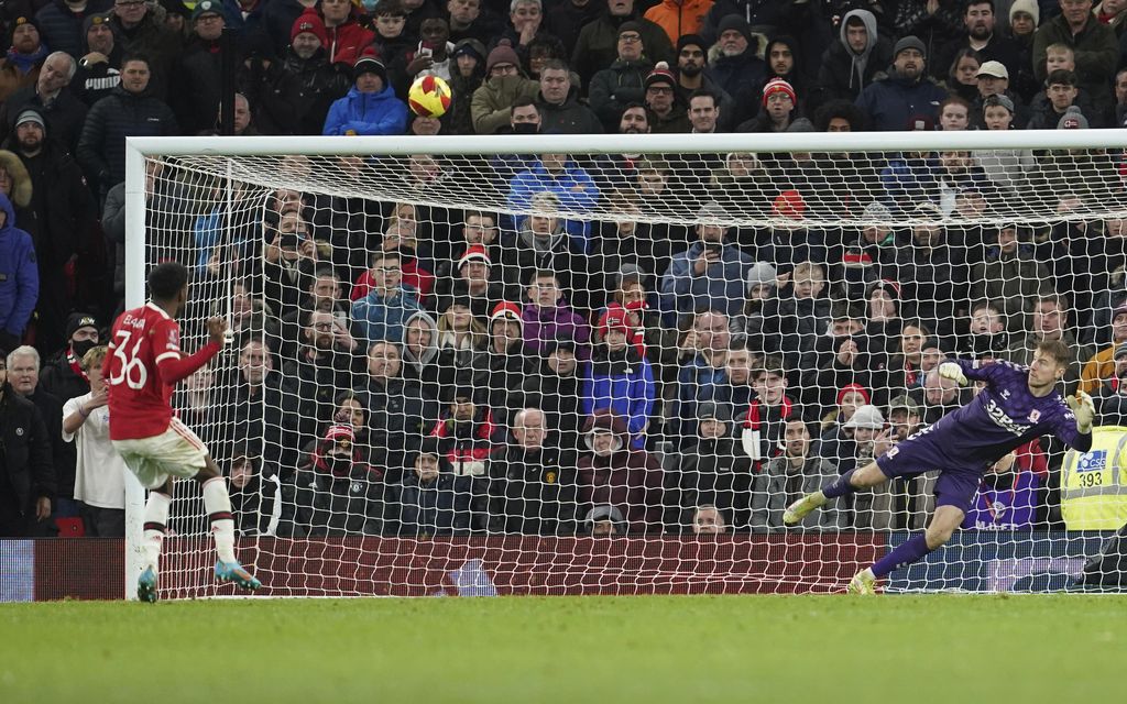 Manchester United's Anthony Elanga fails to score from the penalty spot during the English FA Cup fourth round soccer match between Manchester United and Middlesbrough at Old Trafford stadium in Manchester, England, Friday, Feb. 4, 2022. (AP Photo/Jon Super)