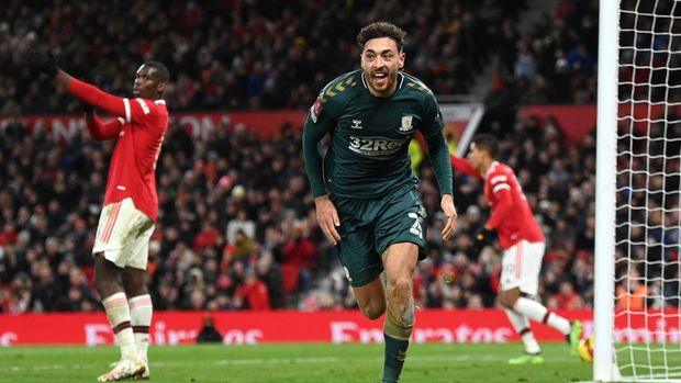 MANCHESTER, ENGLAND - FEBRUARY 04:  Matt Crooks of Middlesbrough celebrates after scoring during the Emirates FA Cup Fourth Round match between Manchester United and Middlesbrough at Old Trafford on February 04, 2022 in Manchester, England. (Photo by Clive Mason/Getty Images)