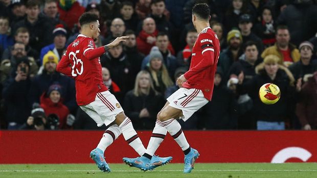 Soccer Football - FA Cup Fourth Round - Manchester United v Middlesbrough - Old Trafford, Manchester, Britain - February 4, 2022 Manchester United's Jadon Sancho shoots at goal REUTERS/Craig Brough