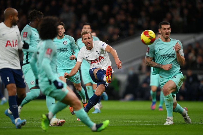 LONDON, ENGLAND - FEBRUARY 05: Harry Kane of Tottenham Hotspur scores their sides first goal during the Emirates FA Cup Fourth Round match between Tottenham Hotspur and Brighton & Hove Albion at Tottenham Hotspur Stadium on February 05, 2022 in London, England. (Photo by Mike Hewitt/Getty Images)