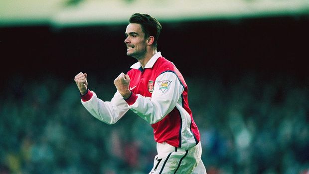 LONDON, UNITED KINGDOM - FEBRUARY 13: Arsenal player Marc Overmars celebrates scoring the 'winning goal' in the FA Cup 5th Round match between Arsenal and Sheffield United at Highbury. The game was eventually replayed after Sheffield United complained about the 'unsportsmanship' which led to Overmars goal.  (Photo by Shaun Botterill/Getty Images)