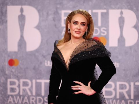 Adele poses as she arrives for the Brit Awards at the O2 Arena in London, Britain, February 8, 2022 REUTERS/Tom Nicholson