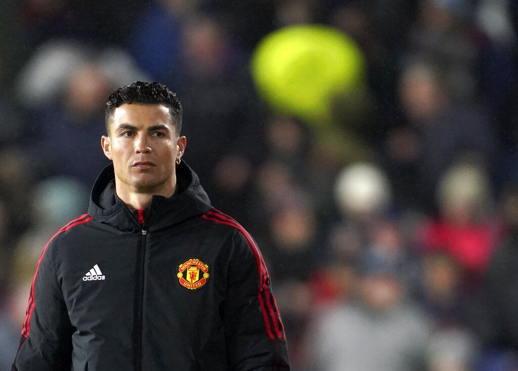 Manchester United's Cristiano Ronaldo walks before the English Premier League soccer match between Burnley and Manchester United at Turf Moor, in Burnley, England, Tuesday, Feb. 8, 2022. (AP Photo/Jon Super)