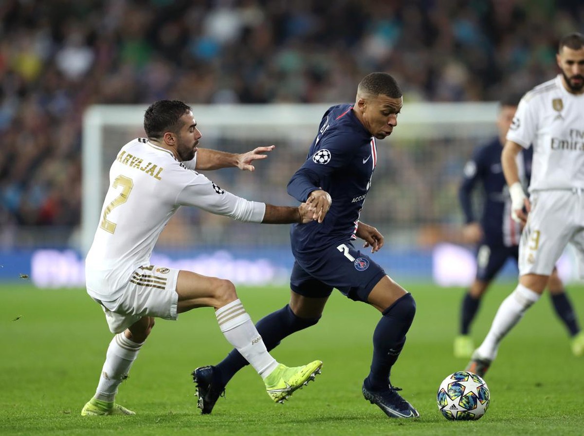 Laga Paris Saint-Germain vs Real Madrid akan tersaji di babak 16 besar Liga Champions dini hari nanti. (Foto: Angel Martinez/Getty Images)