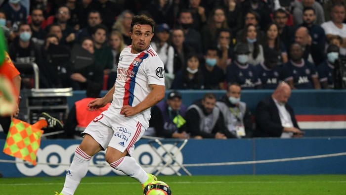 Lyons Swiss midfielder Xherdan Shaqiri drives the ball during the French L1 football match between Paris-Saint Germain (PSG) and Olympique Lyonnais at The Parc des Princes Stadium in Paris on September 19, 2021. (Photo by Alain JOCARD / AFP)