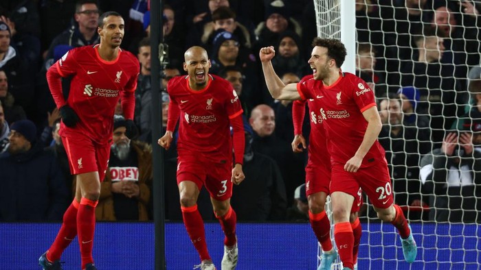 LIVERPOOL, ENGLAND - FEBRUARY 10: Diogo Jota of Liverpool celebrates after scoring their sides first goal during the Premier League match between Liverpool and Leicester City at Anfield on February 10, 2022 in Liverpool, England. (Photo by Clive Brunskill/Getty Images)