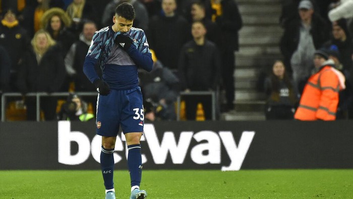 Arsenals Gabriel Martinelli walks after getting a red card during the English Premier League soccer match between Wolverhampton Wanderers and Arsenal at Molineux stadium in Wolverhampton, England, Thursday, Feb. 10, 2022. (AP Photo/Rui Vieira)