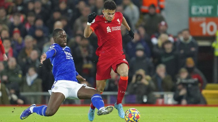 Leicesters Boubakary Soumare, left, tackles Liverpools Luis Diaz during the English Premier League soccer match between Liverpool and Leicester City at Anfield stadium in Liverpool, England, Thursday, Feb. 10, 2022. (AP Photo/Jon Super)