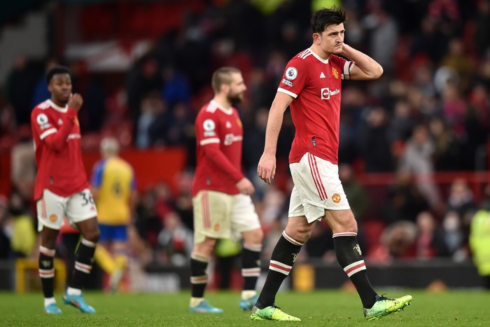 MANCHESTER, ENGLAND - FEBRUARY 12: Harry Maguire of Manchester United reacts after their sides draw during the Premier League match between Manchester United and Southampton at Old Trafford on February 12, 2022 in Manchester, England. (Photo by Nathan Stirk/Getty Images)