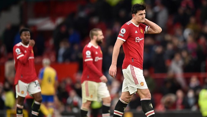 MANCHESTER, ENGLAND - FEBRUARY 12: Harry Maguire of Manchester United reacts after their sides draw during the Premier League match between Manchester United and Southampton at Old Trafford on February 12, 2022 in Manchester, England. (Photo by Nathan Stirk/Getty Images)