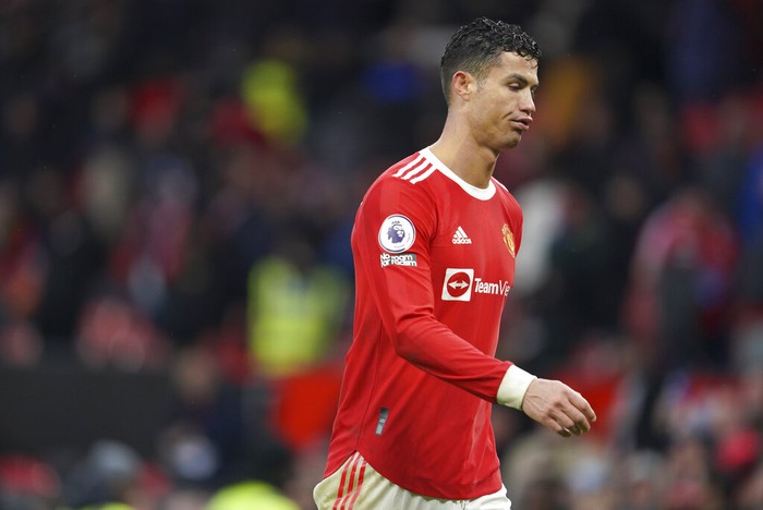 Manchester Uniteds Cristiano Ronaldo leaves the field after the English Premier League soccer match between Manchester United and Southampton at Old Trafford stadium in Manchester, England, Saturday, Feb. 12, 2022. (AP Photo/Jon Super)