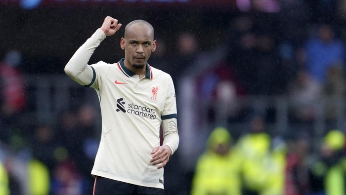 Liverpools Fabinho celebrates after scoring his sides opening goal during the English Premier League soccer match between Burnley and Liverpool at Turf Moor, in Burnley, England, Sunday, Feb. 13, 2022. (AP Photo/Jon Super)