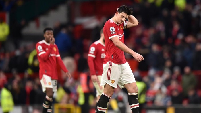 MANCHESTER, ENGLAND - FEBRUARY 12: Harry Maguire of Manchester United reacts after their sides draw during the Premier League match between Manchester United and Southampton at Old Trafford on February 12, 2022 in Manchester, England. (Photo by Nathan Stirk/Getty Images)