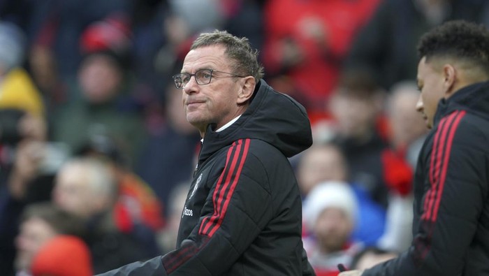 Manchester Uniteds interim manager Ralf Rangnick arrives on the pitch for the English Premier League soccer match between Manchester United and Southampton at Old Trafford stadium in Manchester, England, Saturday, Feb. 12, 2022. (AP Photo/Jon Super)
