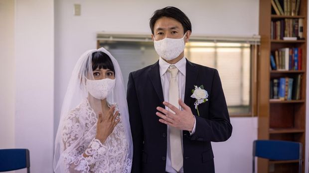 Ilustrasi pasangan menikah di KUA