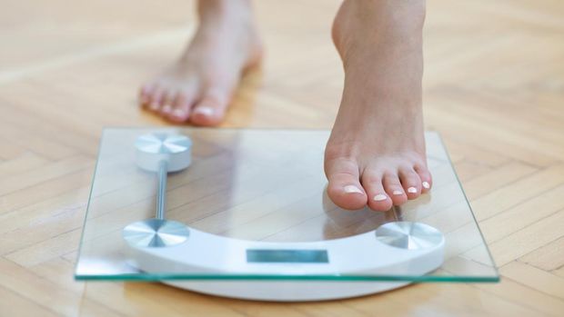 Ilustrasi timbangan berat badan