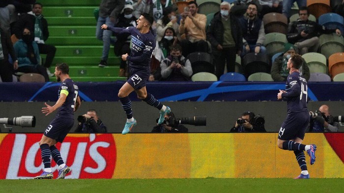 Manchester City berpesta lima gol ke gawang Sporting CP di leg pertama babak 16 besar Liga Champions. Kemenangan itu menempatkan satu kaki City di babak perempatfinal Liga Champions.