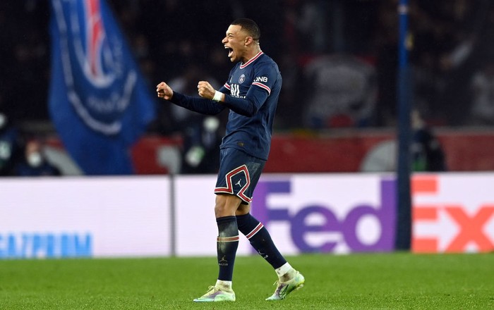 Kylian Mbappe PARIS, FRANCE - FEBRUARY 15: Kylian Mbappe of Paris Saint-Germain celebrates after their sides victory during the UEFA Champions League Round Of Sixteen Leg One match between Paris Saint-Germain and Real Madrid at Parc des Princes on February 15, 2022 in Paris, France. (Photo by Shaun Botterill/Getty Images)