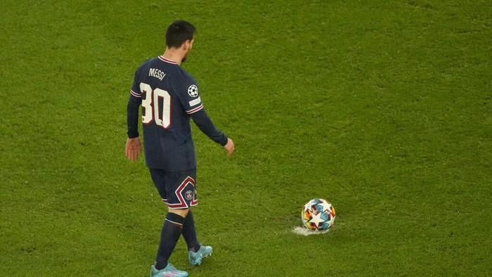 PSGs Lionel Messi looks on during warm up before the Champions League, round of 16, first leg soccer match between Paris Saint Germain and Real Madrid at the Parc des Princes stadium, in Paris, France, Tuesday, Feb. 15, 2022. (AP Photo/Thibault Camus)