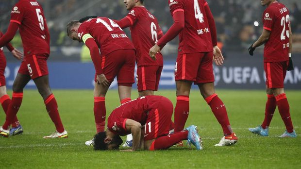 Soccer Football - Champions League - Round of 16 First Leg - Inter Milan v Liverpool - San Siro, Milan, Italy - February 16, 2022 Liverpool's Mohamed Salah celebrates scoring their second goal REUTERS/Alessandro Garofalo