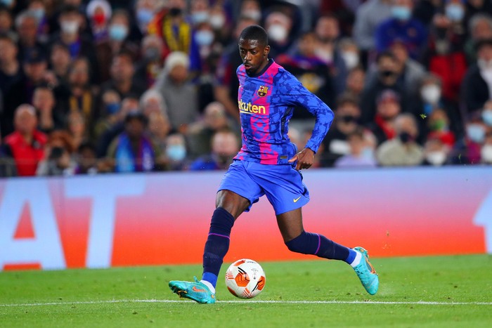 Ousmane Dembele BARCELONA, SPAIN - FEBRUARY 17: Ousmane Dembele of FC Barcelona runs with the ball during the UEFA Europa League Knockout Round Play-Off Leg One match between FC Barcelona and SSC Napoli at Camp Nou on February 17, 2022 in Barcelona, Spain. (Photo by Eric Alonso/Getty Images)