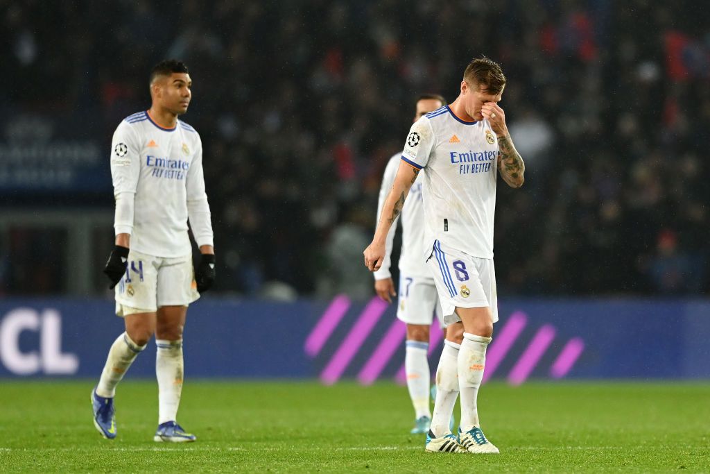 PARIS, FRANCE - FEBRUARY 15: Toni Kroos of Real Madrid reacts after Kylian Mbappe of Paris Saint-Germain (not pictured) scored their sides first goal during the UEFA Champions League Round Of Sixteen Leg One match between Paris Saint-Germain and Real Madrid at Parc des Princes on February 15, 2022 in Paris, France. (Photo by Shaun Botterill/Getty Images)