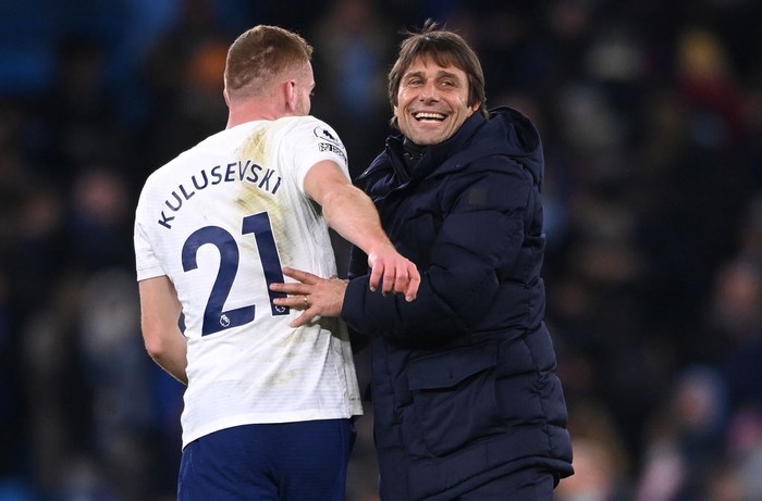 MANCHESTER, ENGLAND - FEBRUARY 19: Spurs head coach Antonio Conte congratulates Dejan Kulusevski after the Premier League match between Manchester City and Tottenham Hotspur at Etihad Stadium on February 19, 2022 in Manchester, England. (Photo by Stu Forster/Getty Images)