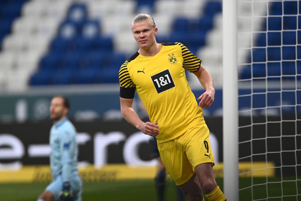 SINSHEIM, GERMANY - JANUARY 22: Erling Haaland of Borussia Dortmund celebrates after scoring their side's first goal during the Bundesliga match between TSG Hoffenheim and Borussia Dortmund at PreZero-Arena on January 22, 2022 in Sinsheim, Germany. (Photo by Alexander Scheuber/Getty Images)