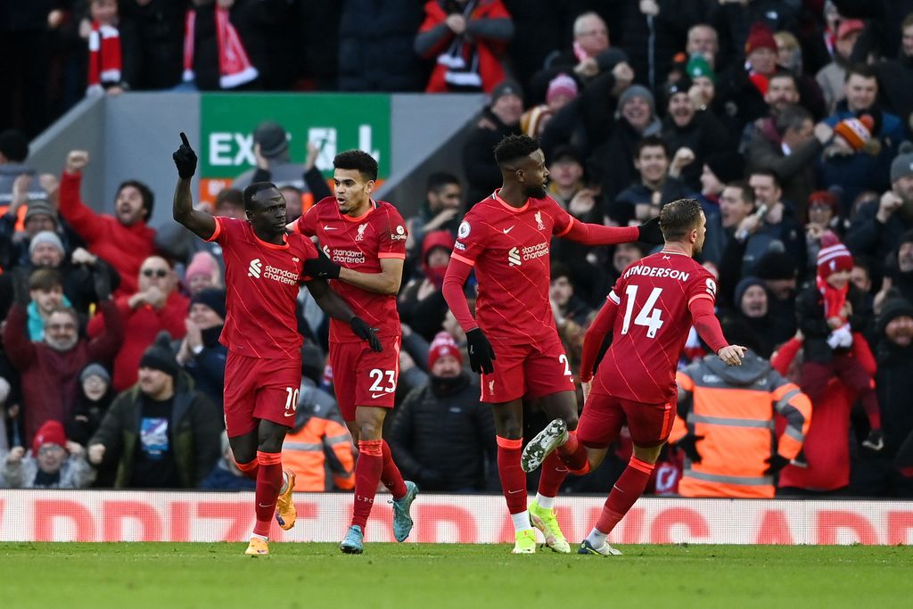 LIVERPOOL, ENGLAND - FEBRUARY 19: Sadio Mane celebrates with Luis Diaz of Liverpool after scoring their team's first goal during the Premier League match between Liverpool and Norwich City at Anfield on February 19, 2022 in Liverpool, England. (Photo by Gareth Copley/Getty Images)