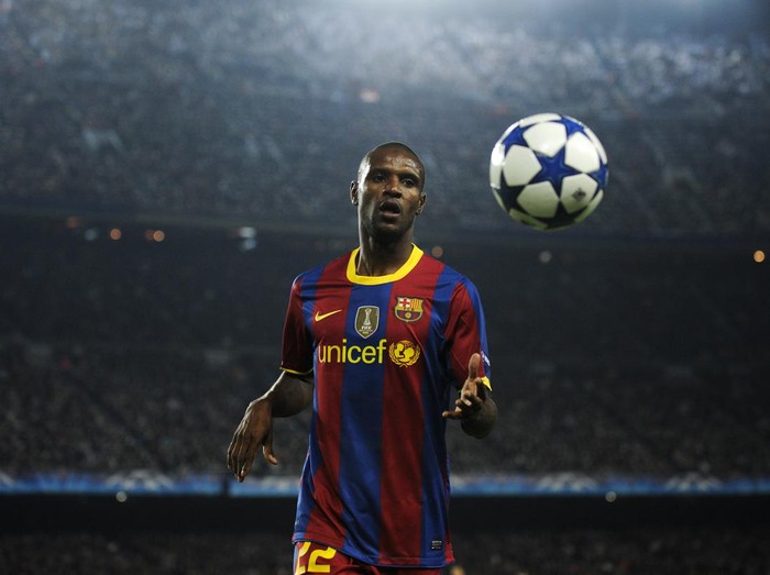 BARCELONA, SPAIN - OCTOBER 20: Eric Abidal of Barcelona runs to catch the ball during the UEFA Champions League group D match between Barcelona and FC Copenhagen at the Camp nou stadium on October 20, 2010 in Barcelona, Spain. Barcelona won the match 2-0. (Photo by David Ramos/Getty Images)