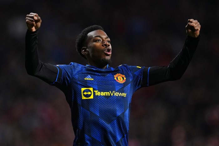 Manchester Uniteds Anthony Elanga scores his sides first goal during the Champions League, round of 16, first leg soccer match between Atletico Madrid and Manchester United at the Wanda Metropolitano stadium in Madrid, Spain, Wednesday, Feb. 23, 2022. (AP Photo/Manu Fernandez)