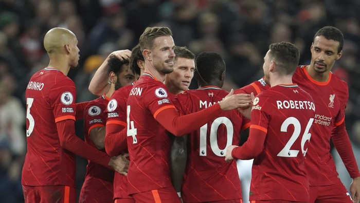 Liverpools Sadio Mane, center, celebrates his goal with his teammates against Leeds United during the English Premier League soccer match between Liverpool and Leeds United at Anfield stadium in Liverpool, England, Wednesday, Feb. 23, 2022. (AP Photo/Jon Super)