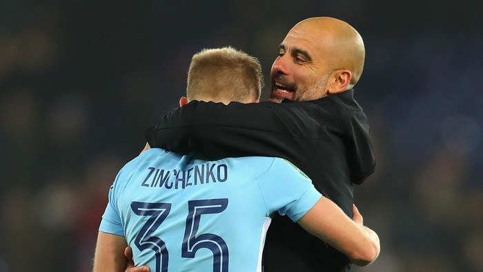LEICESTER, ENGLAND - DECEMBER 19:  Oleksandr Zinchenko of Manchester City and Josep Guardiola, Manager of Manchester City celebrate penalty shoot out victory after the Carabao Cup Quarter-Final match between Leicester City and Manchester City at The King Power Stadium on December 19, 2017 in Leicester, England.  (Photo by Catherine Ivill/Getty Images)